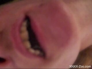 MILF shows off holding animal sperm in her mouth